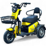 Двуместна електрическа триколка bullmax pudding premium, с дълга платформа, крачна спирачка и диференциално задвижване